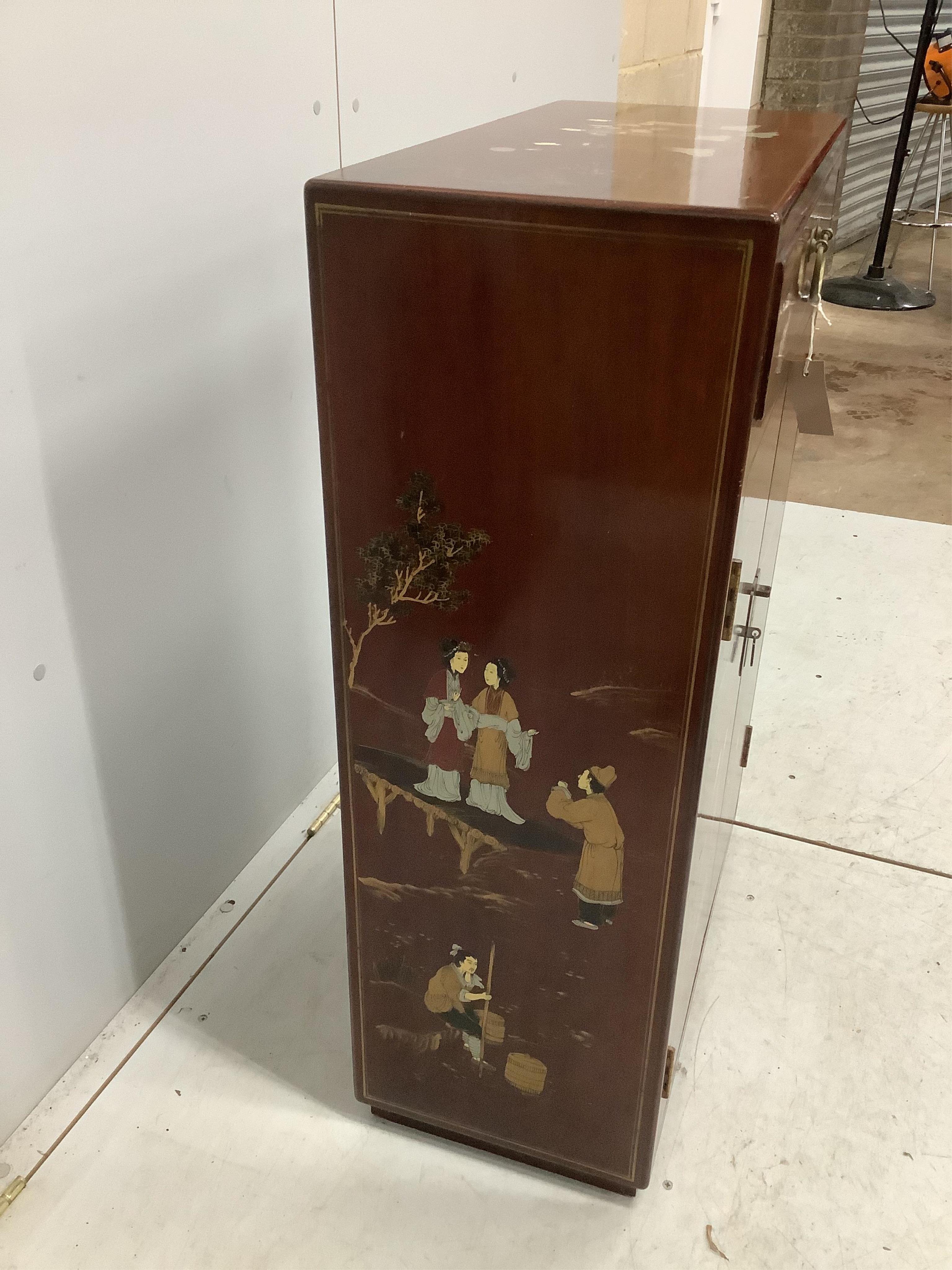 A Chinese painted hardwood side cabinet, width 60cm, depth 30cm, height 91cm. Condition - good